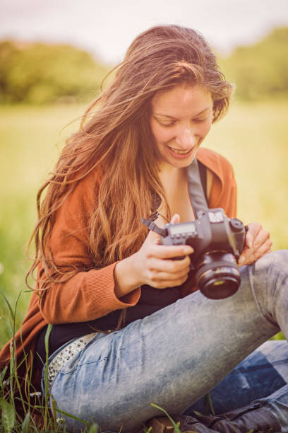 istock Young professional photographer in the nature 688303534