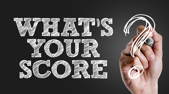 Hand writing the text: Whats Your Score?