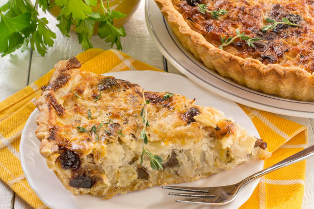 istock Delicious homemade quiche with cabbage and dried prunes 688306662