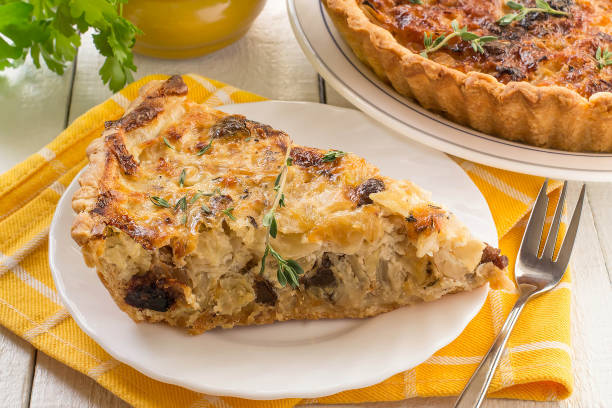istock Delicious homemade quiche with cabbage and dried prunes 688306666