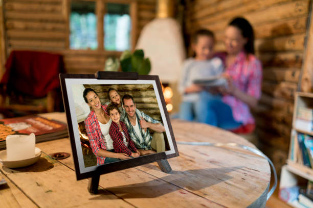 Picture of a beautiful happy family on a frame at home Picture of a beautiful happy Latin American family on a frame at home - lifestyle concepts cottage photos stock pictures, royalty-free photos & images
