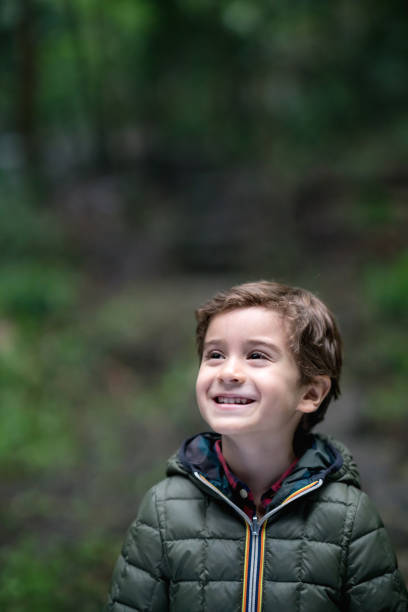istock Happy boy having fun walking outdoors 688307430