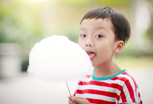 Child Eating Candyfloss or Cotton Candy