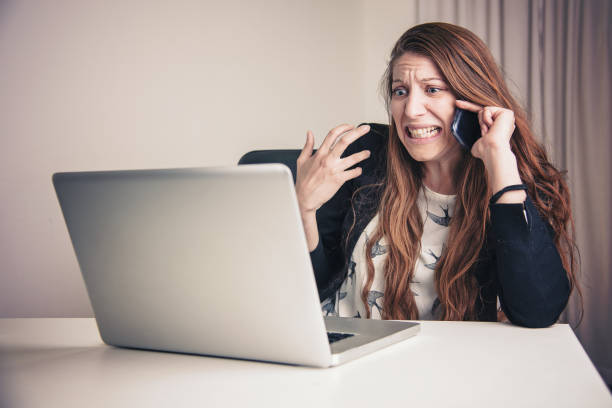 istock Phone yelling business woman 688311868