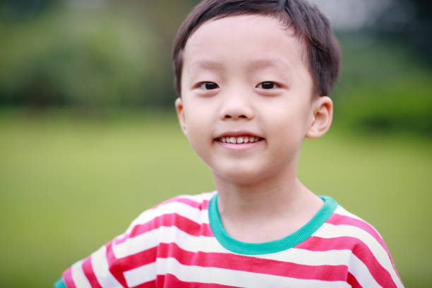 istock The child was lying on the grass 688322134