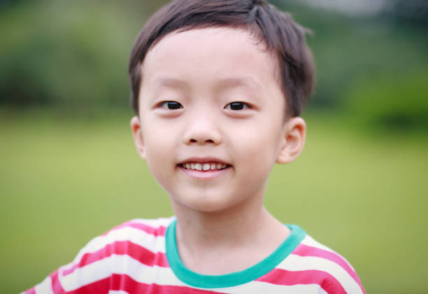 istock The child was lying on the grass 688322388