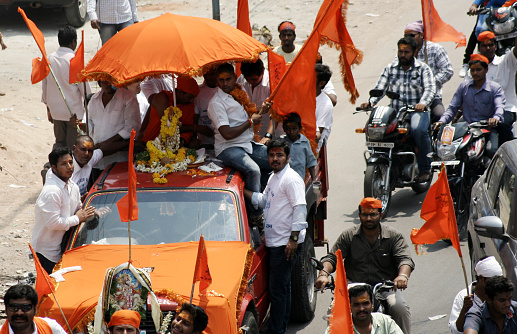 HYDERABAD,INDIA-APRIL 16:Hindu devotess take a Hanuman Jayanthi Shobha Yatra of Hanuman god ,a devotee of Lord Rama in Hyderabad,india on April 16,2014.