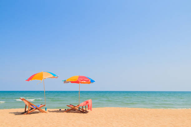 istock Beach chair and umbrella 688325738