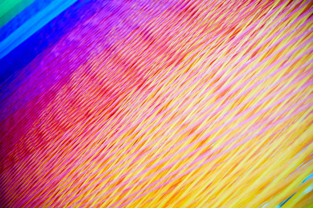 istock Strands of colorful  Yarn on a Loom 688328744