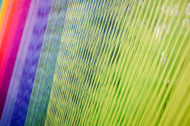 istock Strands of colorful  Yarn on a Loom 688329292