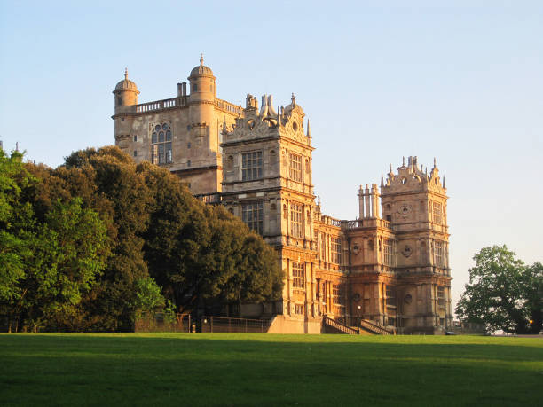 Wollaton Hall in Nottingam NOTTINGHAM, UNITED KINGDOM - 22 May, 2012: A view of the historic Wollaton Hall at sunset on the grounds of Wollaton Park in Nottingham. It is home to the Nottingham Natural History Museum. nottingham stock pictures, royalty-free photos & images