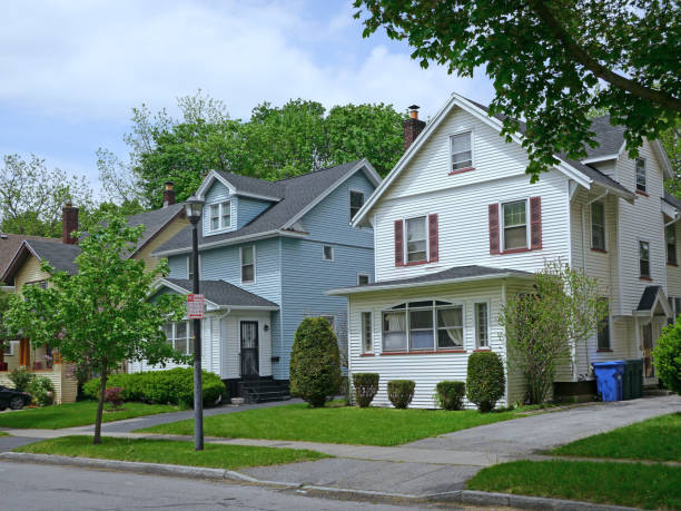istock middle class suburban houses with gables and siding 688340766