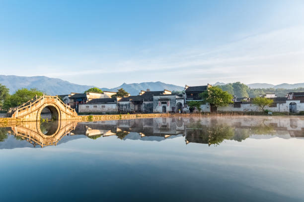 chinese ancient villages in early morning beautiful ancient villages in the early morning, hongcun, southern anhui province, China ancient villages stock pictures, royalty-free photos & images