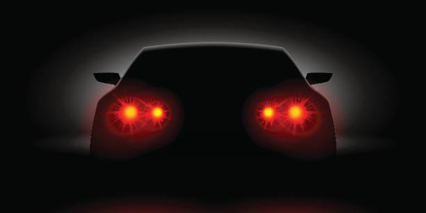 Car headlights shining in the dark back view vector art illustration
