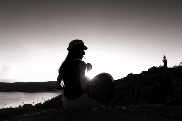 istock Guitar music at sunset 688362262