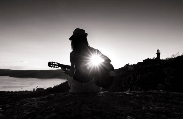 istock Guitar music at sunset 688362276