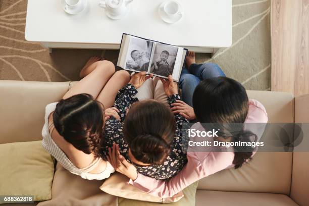 Watching Baby Photos Stock Photo - Download Image Now - Nostalgia, Memories, Family