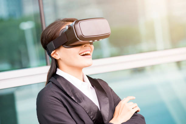 istock asian business woman point pressing touch screen by virtual reality 688367956