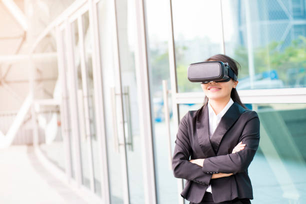 istock asian business woman point pressing touch screen by virtual reality 688368126