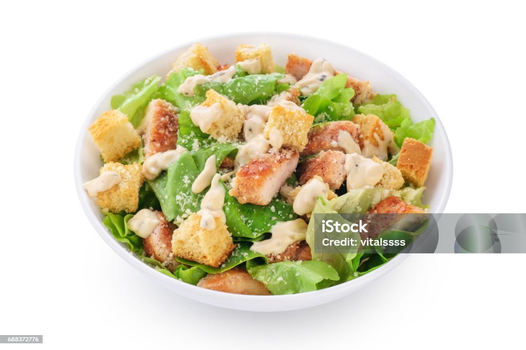 Caesar salad on white background. Caesar salad on white background. Healthy food. Caesar Salad Stock Photo