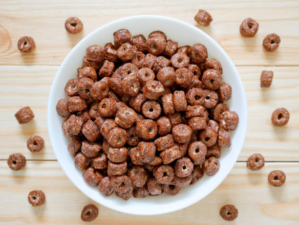 istock Chocolate cereal on wooden background 688390100