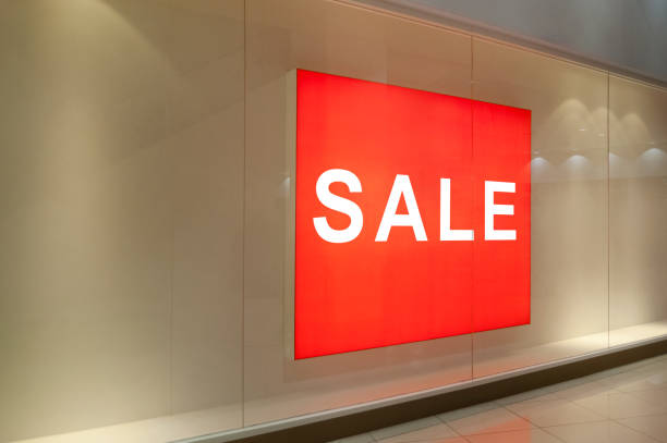 istock Sale signs in shop window 688390392