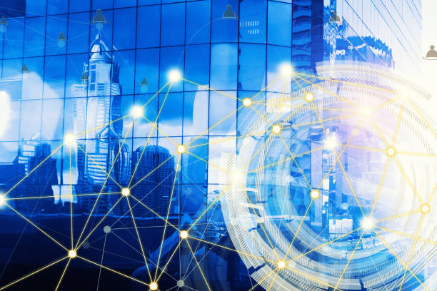 istock Business skyscraper reflected in windows with network connection concept. Blue tone. 688391092