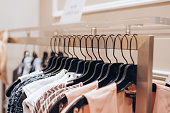 Dresses hanged in a clothing store