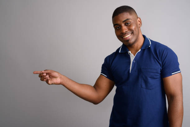 istock Studio shot of African man against gray background 688403716
