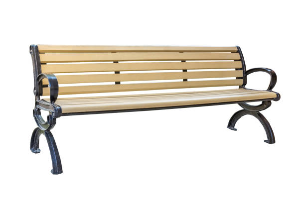 istock yellow park bench . Isolated over white background with clipping path. 688406900