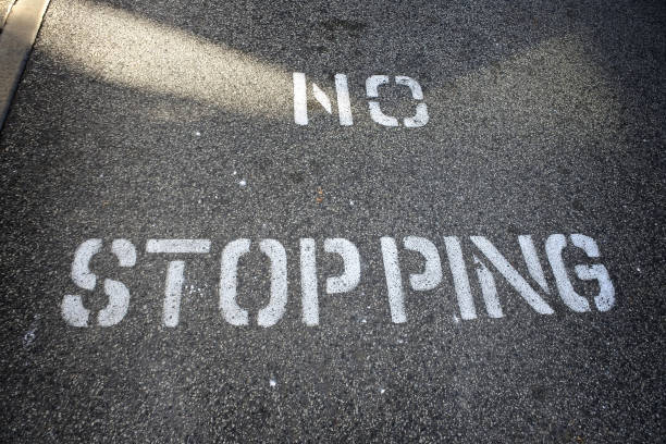 istock Road Sign Stencil 'No Stopping' 688410004