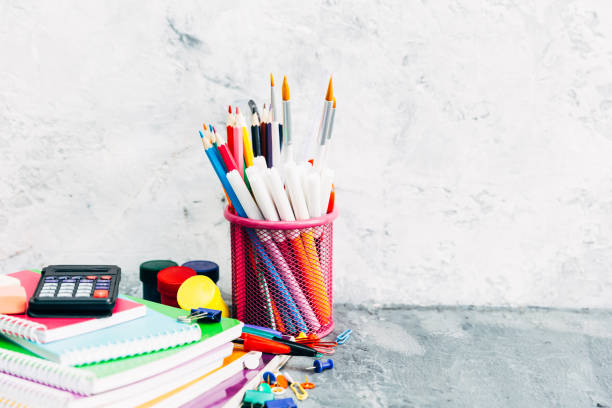 istock Assorted school supplie with a notebooks, pencils, pens, scissors etc. 688410874