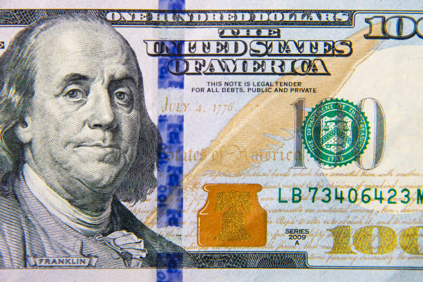 istock Macro shot of one hundred dollars bill 688414206