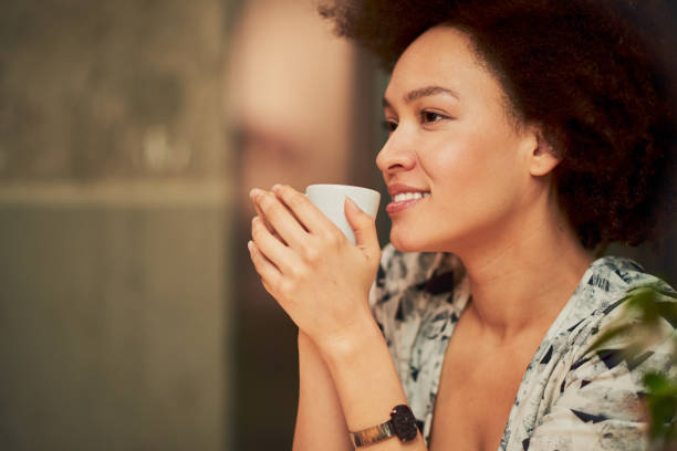 istock Mixed race girl in coffee shop 688421234