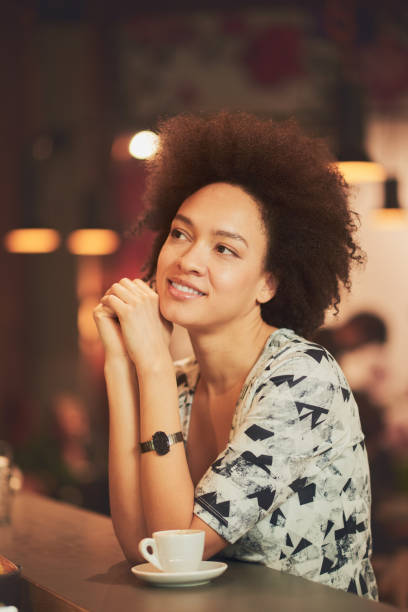 istock Mixed race girl in coffee shop 688421274
