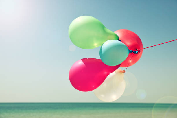 istock Multicolored balloons against the sky 688424598