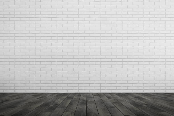 istock Empty room white brick wall, black wood floor 688438206