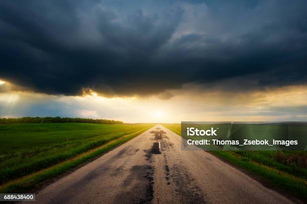 Country Road Stromy Weather Stock Photo - Download Image Now - Hungary, Storm Cloud, Agricultural Field