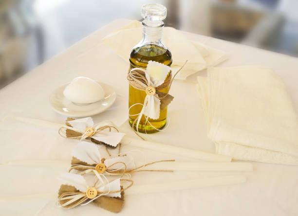 greek christening oil - candles and soap Orthodox Christening oil with candles and soap - greek baptism decor pics of the godmother stock pictures, royalty-free photos & images