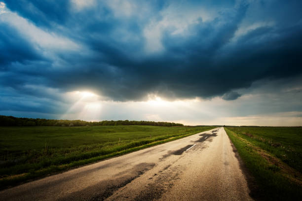 istock Country road stromy weather 688438566
