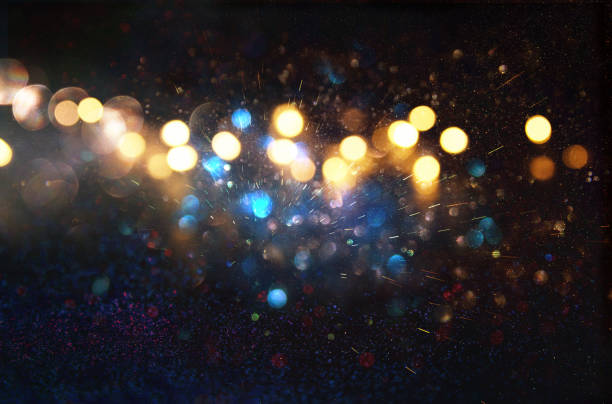 istock glitter vintage lights background. de-focused 688441276