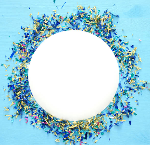 istock party blue background with colorful confetti 688444234