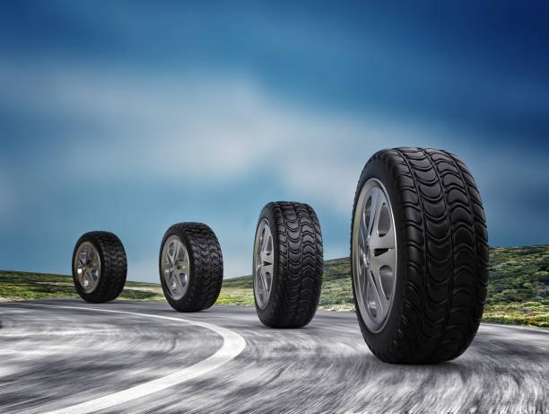 istock Four automobile wheels on the road. 3d render 688451110
