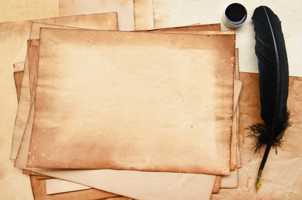 istock old paper with feather and ink 688453956