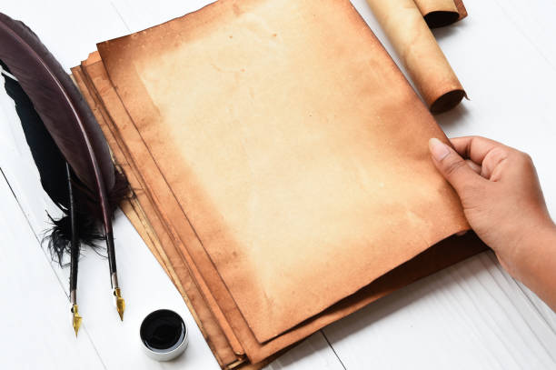 istock old paper with feather and ink 688453988