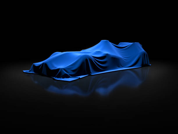 istock open-wheel single-seater racing car car launch in clean empty dark studio, open-wheel single-seater racing car car covered with fabric pre launch 688457880