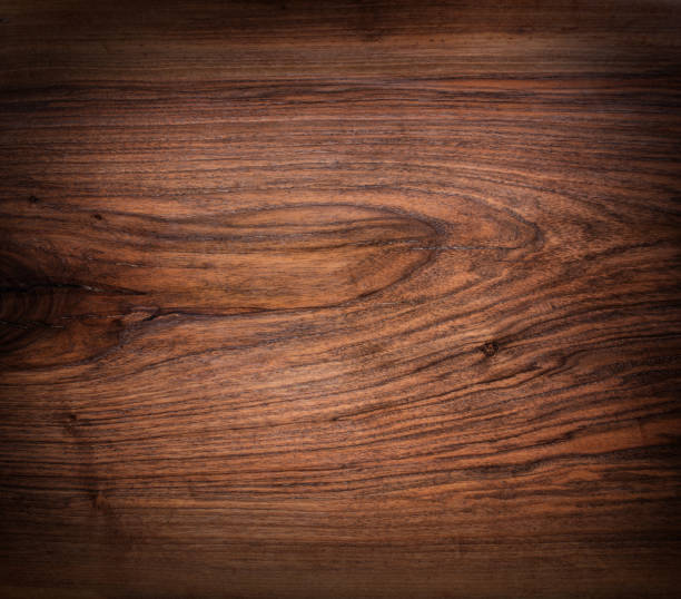 istock Rich chocolate-brown nutwood. Walnut wooden texture. 688458484