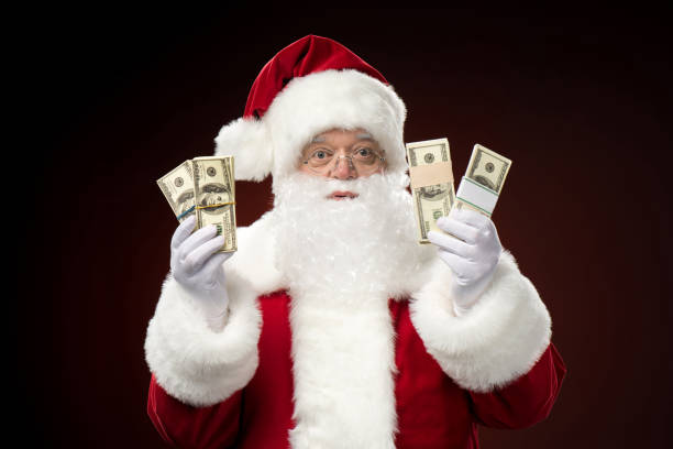 istock Santa Claus with dollars 688458756