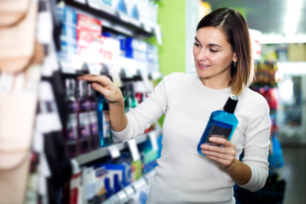 istock Woman choosing best mouthwash 688461414