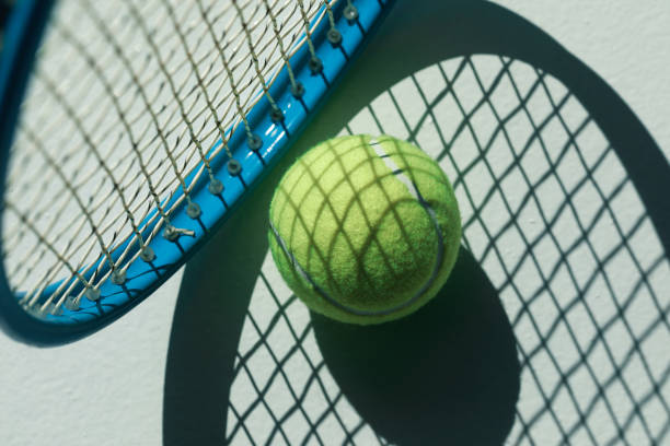 istock tennis racket and ball on the floor 688464738